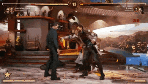 two men are fighting in a video game and one of them is johnny cole