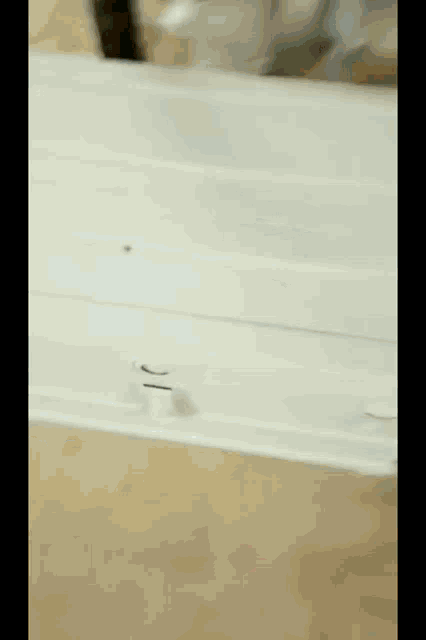a close up of a white box with a hole in the middle of it .