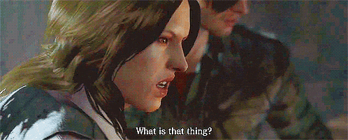 a woman is talking to a man in a video game and asking what is that thing .
