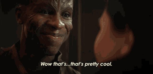 a man says wow that 's that 's pretty cool in front of a woman