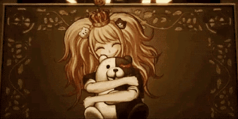a girl with a crown on her head holds a teddy bear