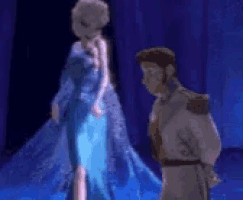 a man and a woman are standing next to each other in a dark room .
