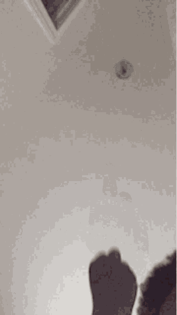 a hand is making a middle finger sign