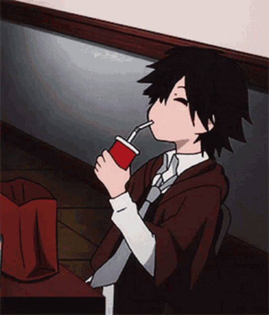a cartoon character is drinking through a straw from a red cup