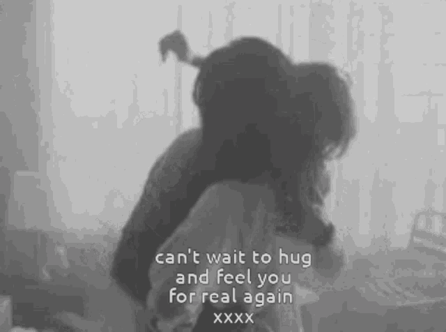 a black and white photo of a couple hugging each other with a quote .