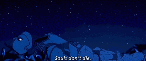 a robot laying on the ground with the words souls don 't die written on the bottom