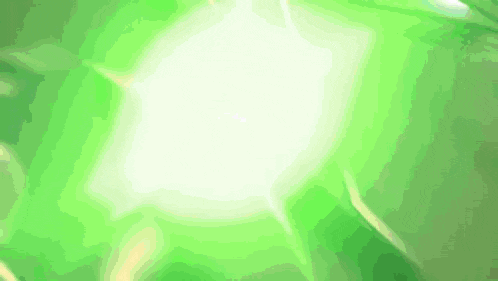 a green background with a white glowing object in the middle .