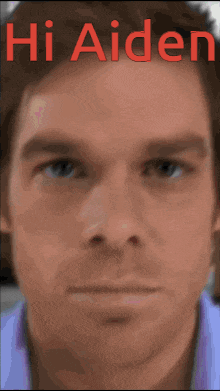 a close up of a man 's face with the words hi aiden written above it