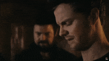 a man says they are like fine wine okay in front of a brick wall