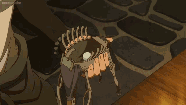a person sitting at a wooden table in front of a sink that says animepoint