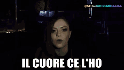 a woman says il cuore ce l' ho in the dark