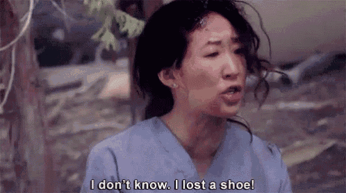 a woman in scrubs is talking about losing a shoe in a scene from a tv show .