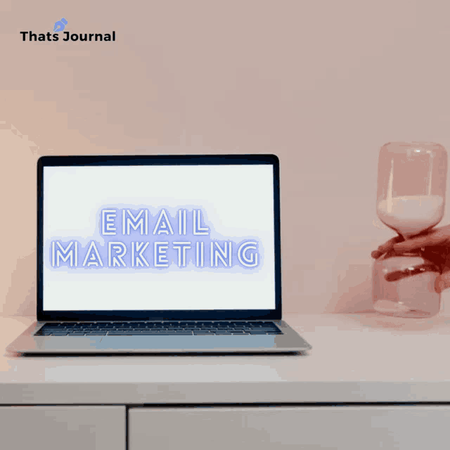 a laptop with email marketing written on the screen