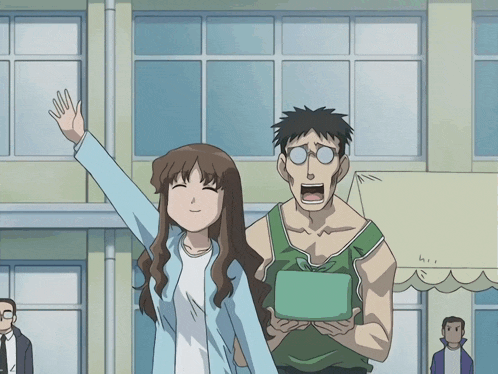 a man and a woman are standing in front of a building and the woman is waving