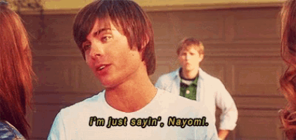 a man in a white shirt says i 'm just sayin ' nayomi