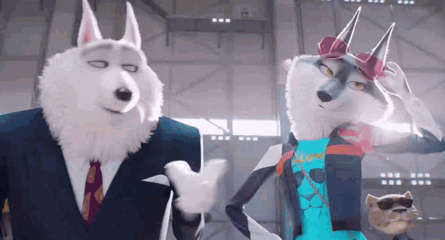 a husky and a fox are standing next to each other in a room
