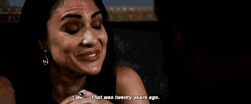 a woman says that was twenty years ago in a dark room