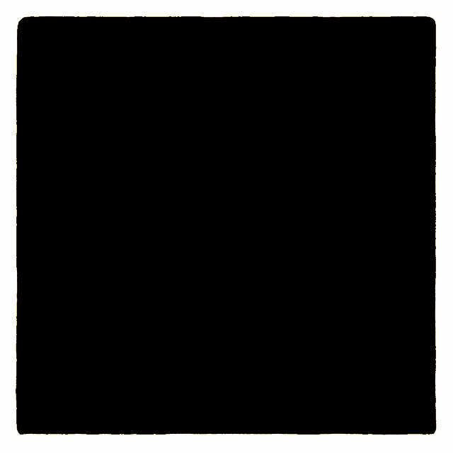 a black square with a yellow eye on it