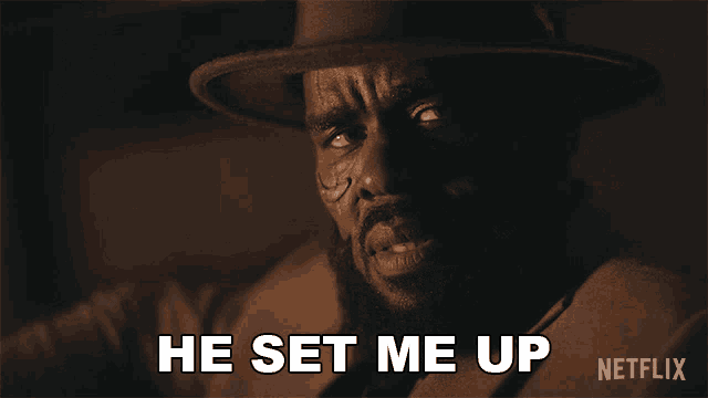 a man in a hat says " he set me up "
