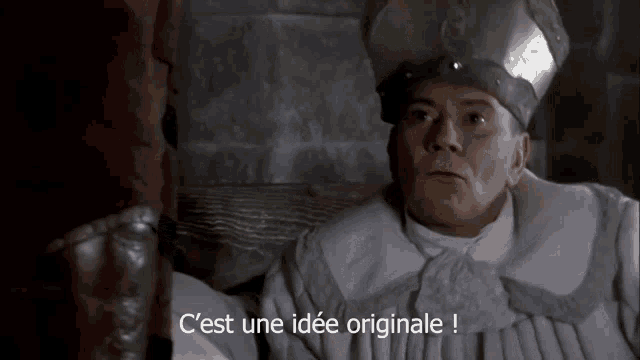 a man in a white robe with the words c'est une idee originale written on the bottom