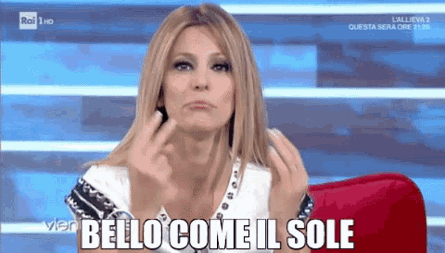 a woman is giving the middle finger and the words bello come il sole are on the screen