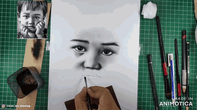 a drawing of a child 's face is being made by animatica
