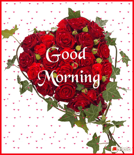 a heart shaped bouquet of red roses with the words good morning written on it