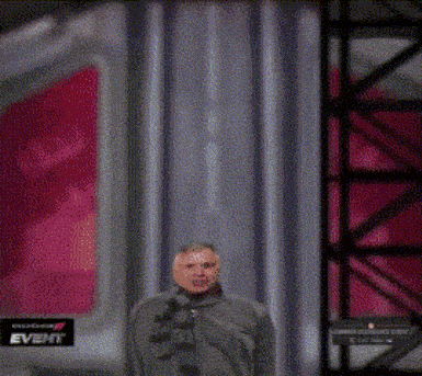 a man is standing in front of a fan that says dodge event
