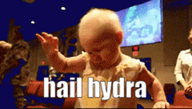 a baby says hail hydra in a blurry photo