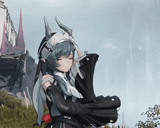 a girl with horns on her head is standing in a field with her eyes closed .
