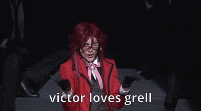 a man in a red jacket with the words victor loves grell on the bottom