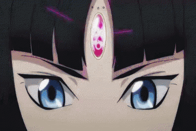 a close up of a person 's face with blue eyes and a purple jewel on their forehead