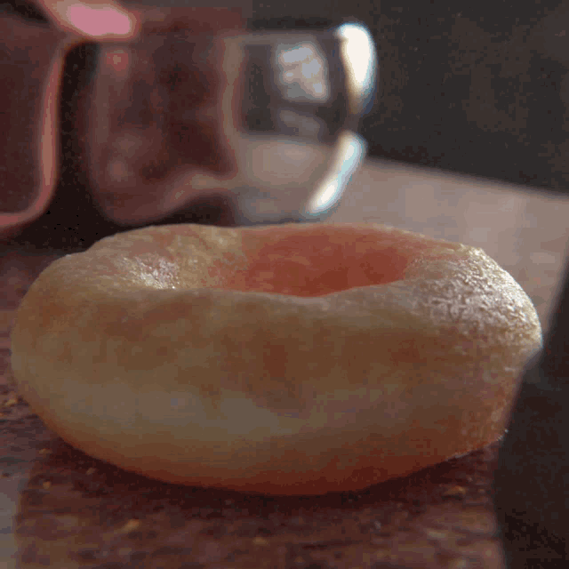 a person with a donut on their head wearing nike shoes