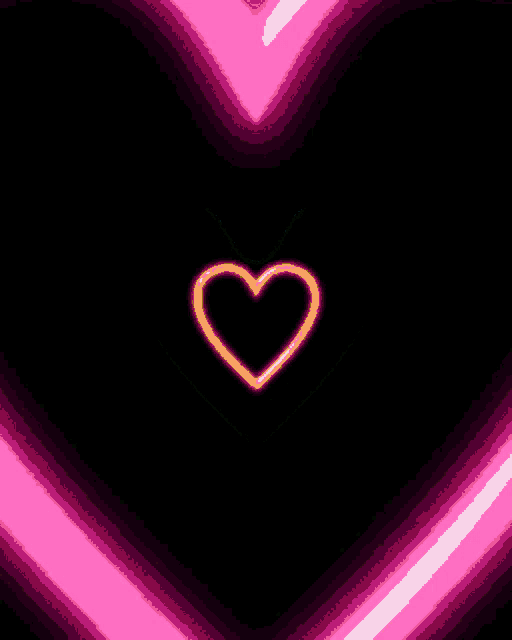 a neon heart is glowing brightly in the dark on a black background .