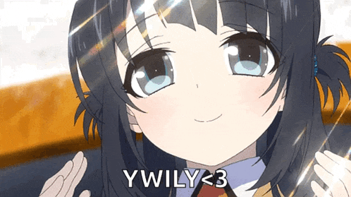 a close up of a girl 's face with the words ywily < 3 below her