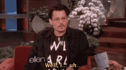 johnny depp is wearing a shirt that says well