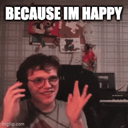 a man wearing headphones is making a funny face with the caption because im happy .