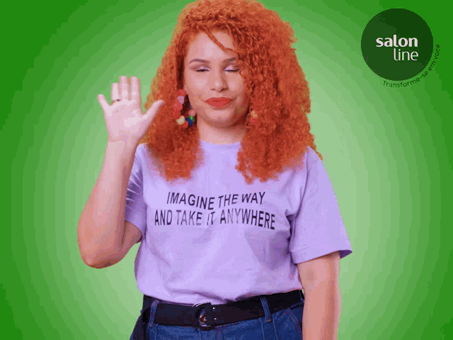 a woman with red hair is wearing a shirt that says imagine the way and take it anywhere