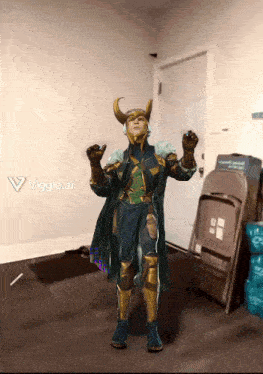 a person in a superhero costume is standing in a room with a viggle.ai logo