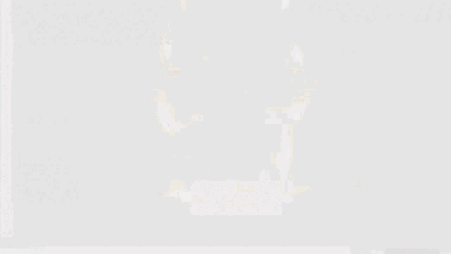 a rocket is being launched into space with a yellow flame coming out of it .