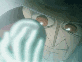 a man with a hat and glasses is holding a blue object