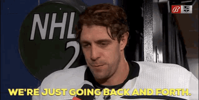 a hockey player says we 're just going back and forth in the locker room