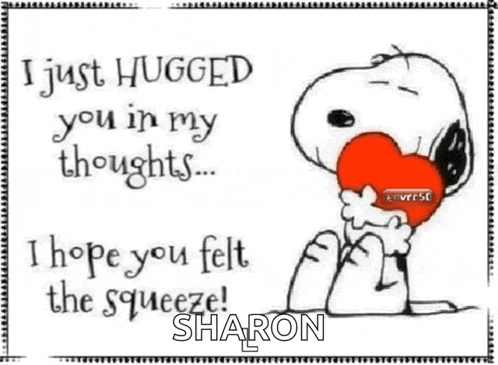 a cartoon of snoopy holding a heart with the name sharon on it