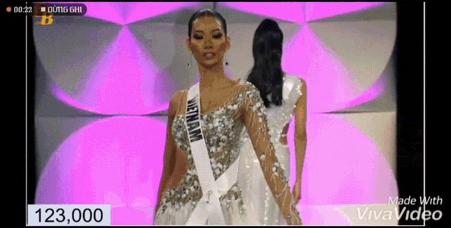 a miss universe contestant walks down the runway