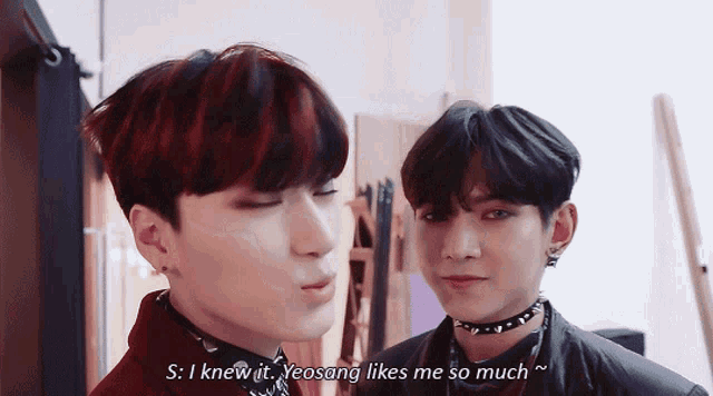 two young men are standing next to each other and one of them says " s i knew it yeosang likes me so much "