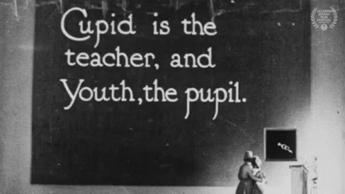Cupid Is The Teacher And Youth The Pupil Broken Barriers GIF - Cupid Is The Teacher And Youth The Pupil Broken Barriers Youth Is The Student And Cupid The Teacher GIFs