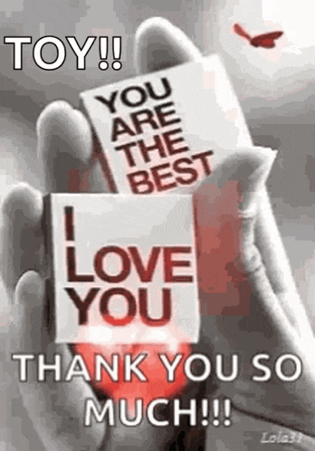 a person is holding a card that says `` you are the best i love you `` .