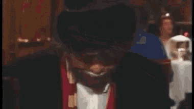 a man with a beard and a top hat is saying i 'm so hungry