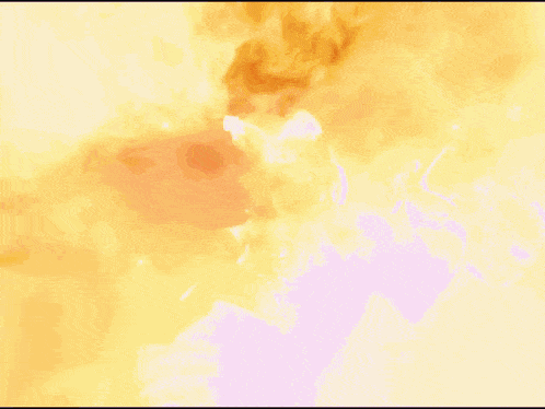 a woman in a white dress is surrounded by flames and smoke