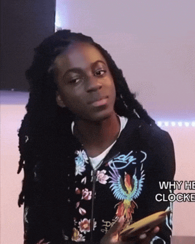 a young man with dreadlocks is wearing a jacket that says fly on it